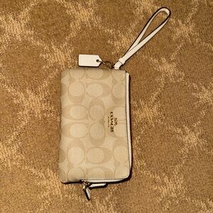 Coach Light Beige Wristlet with Logo Pattern